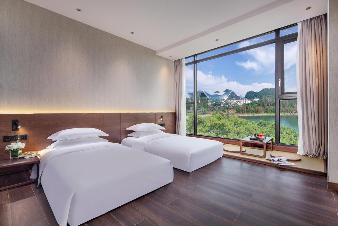 Riverside Wing Hotel Guilin Quarto foto