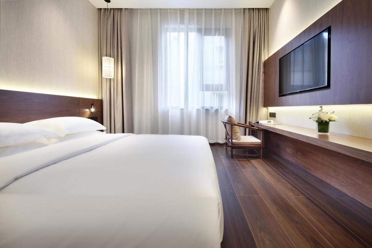 Riverside Wing Hotel Guilin Quarto foto
